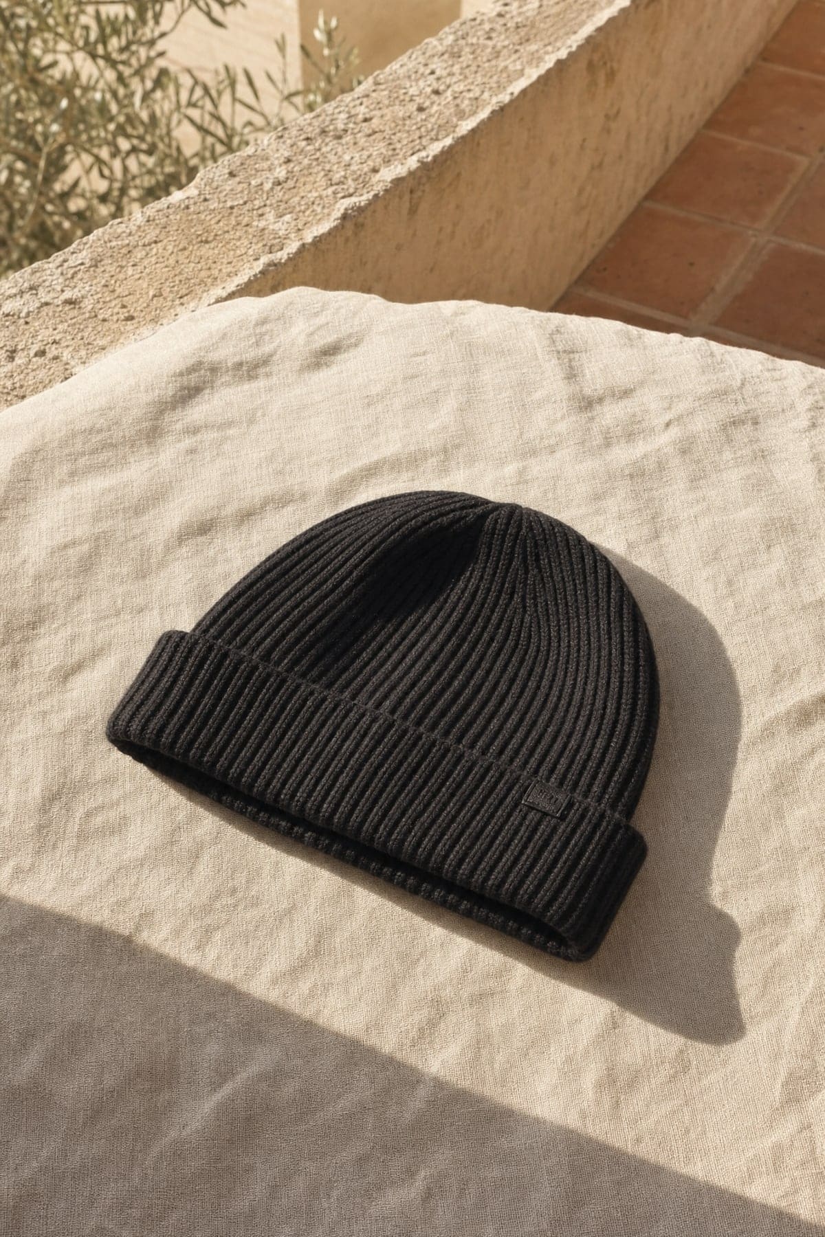 Beanie in ink, in warm afternoon light