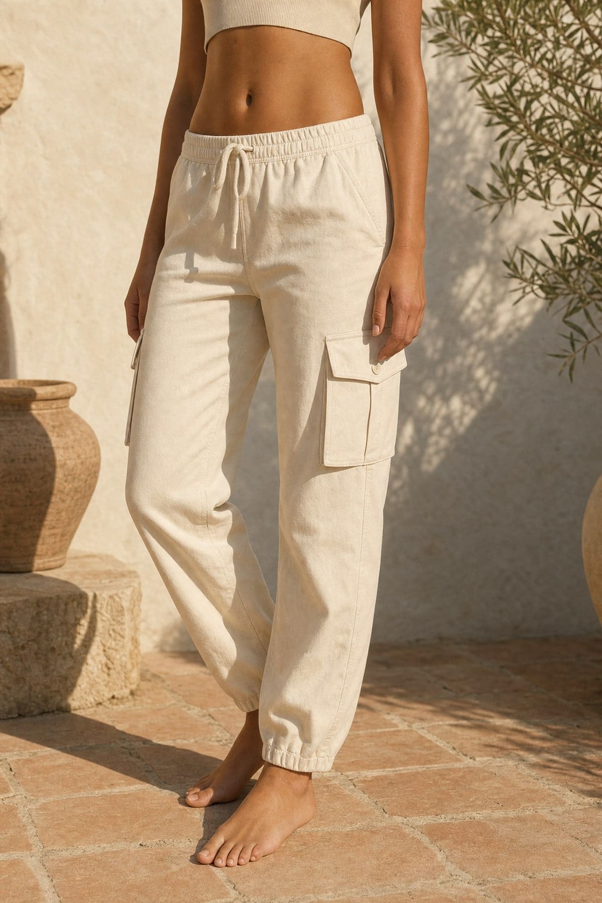Cargo in ecru, worn outdoors in warm afternoon light