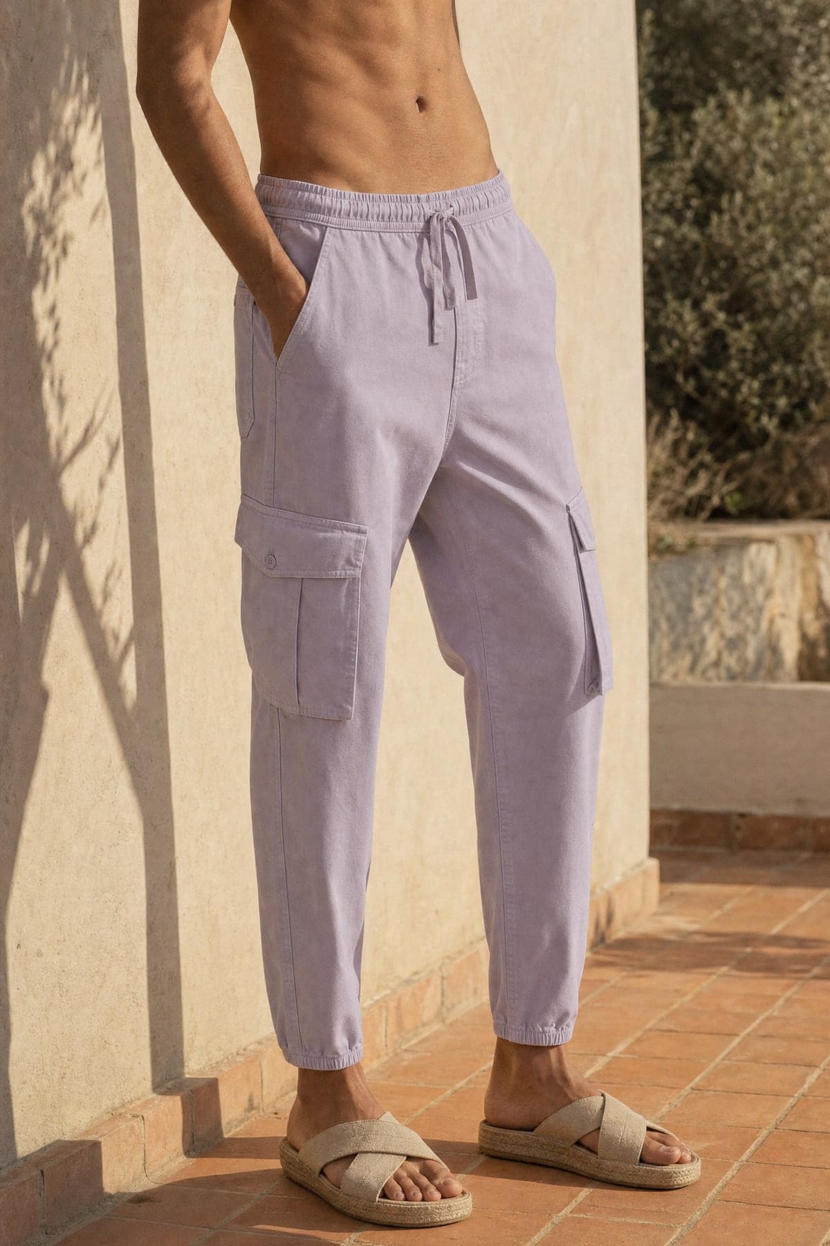Cargo in lilac, worn outdoors in warm afternoon light