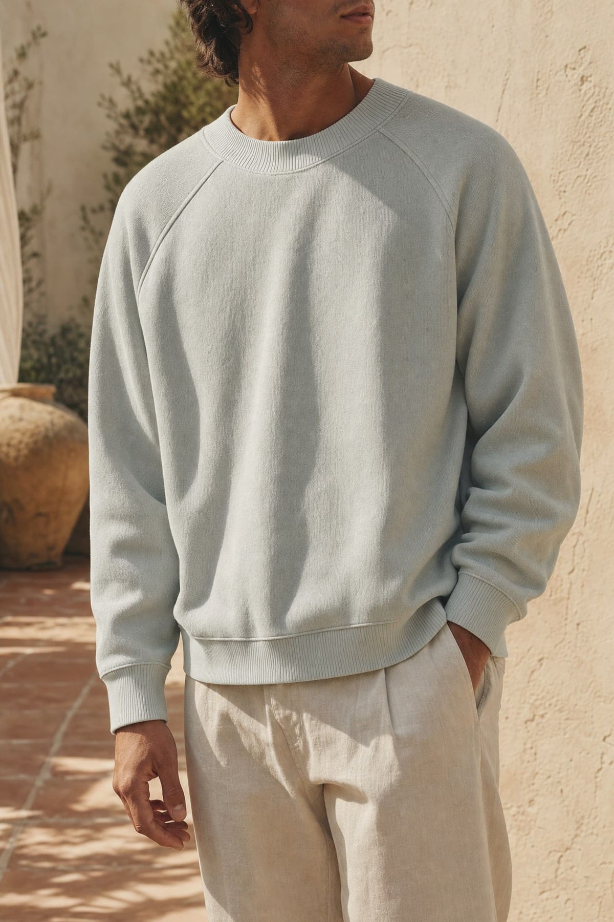 Crewneck in mist, worn outdoors in warm afternoon light