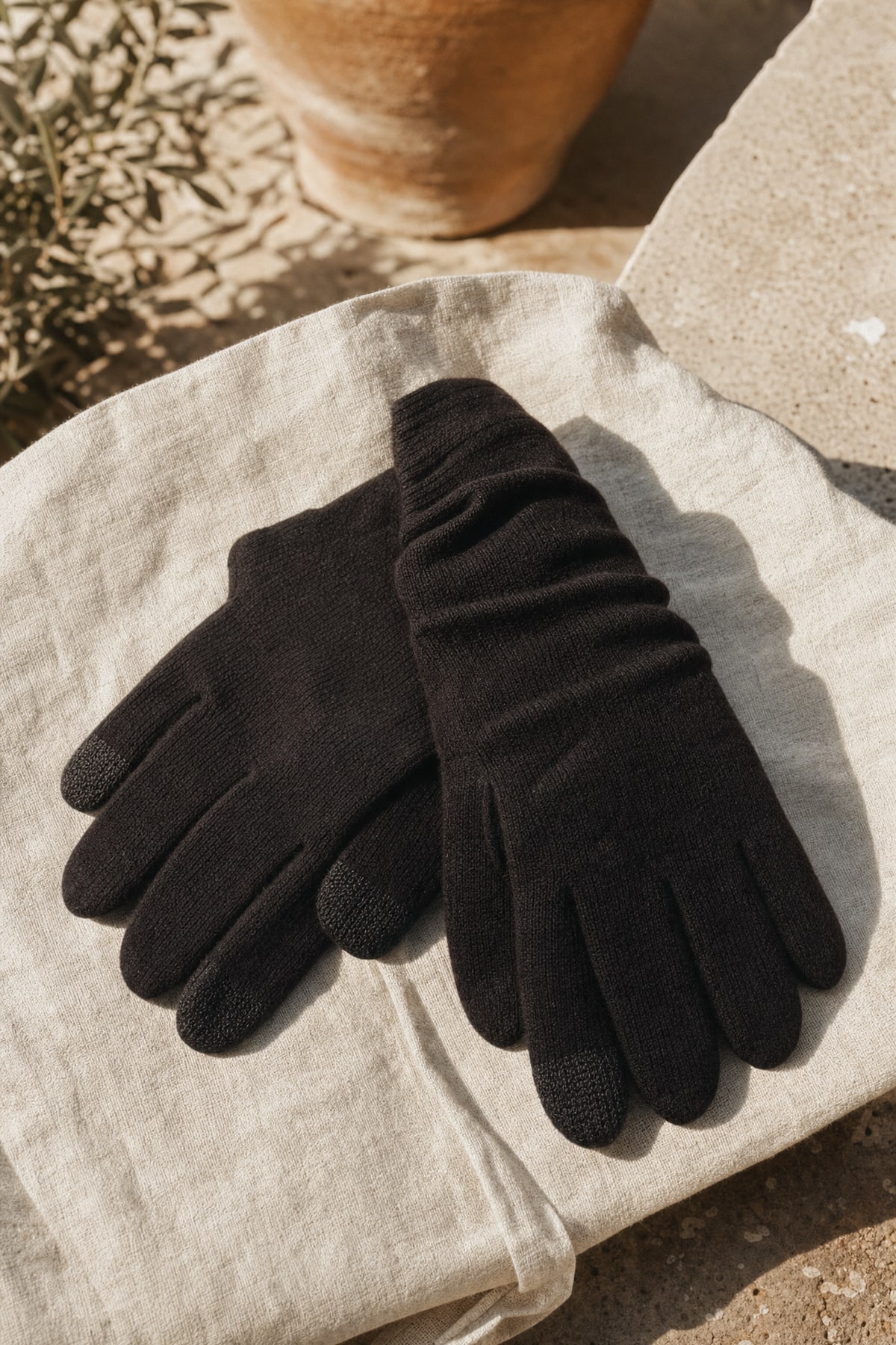 Gloves in ink, in warm afternoon light