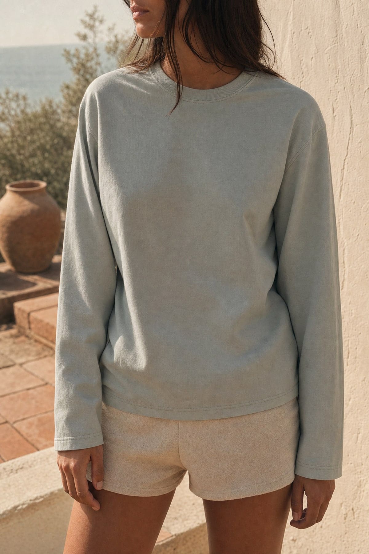 Long-sleeve in mist, worn outdoors in warm afternoon light