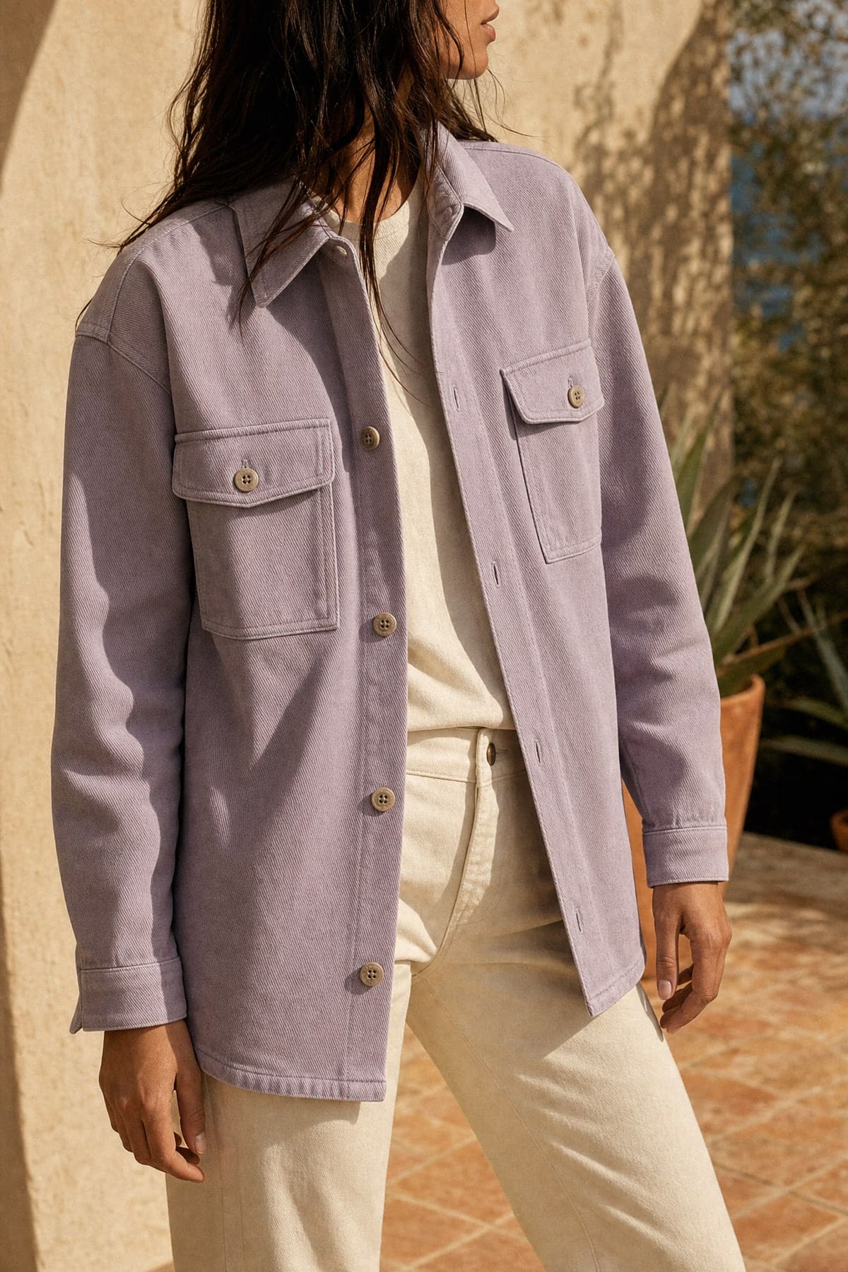 Overshirt in lilac, worn outdoors in warm afternoon light