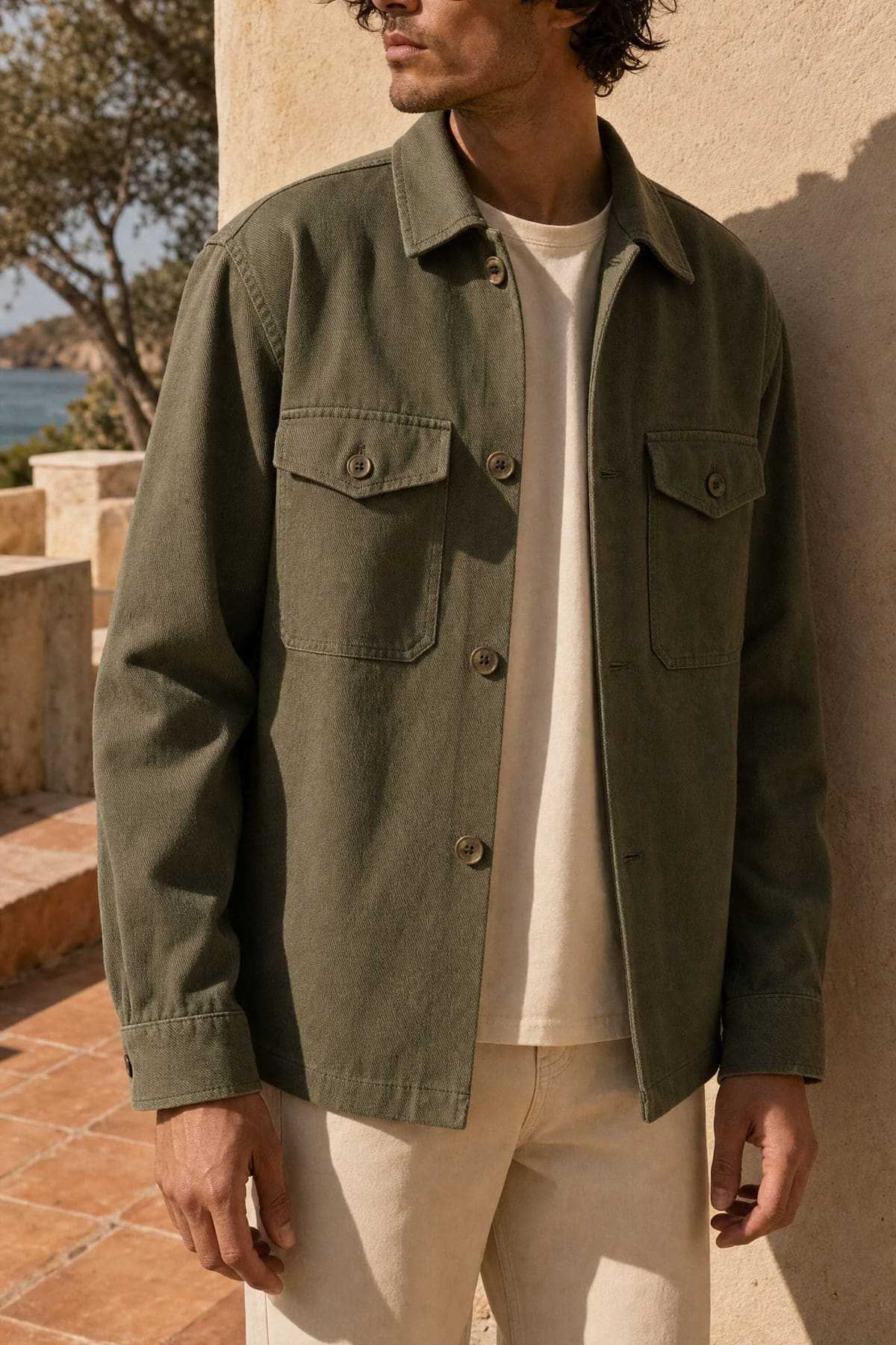 Overshirt in olive, worn outdoors in warm afternoon light