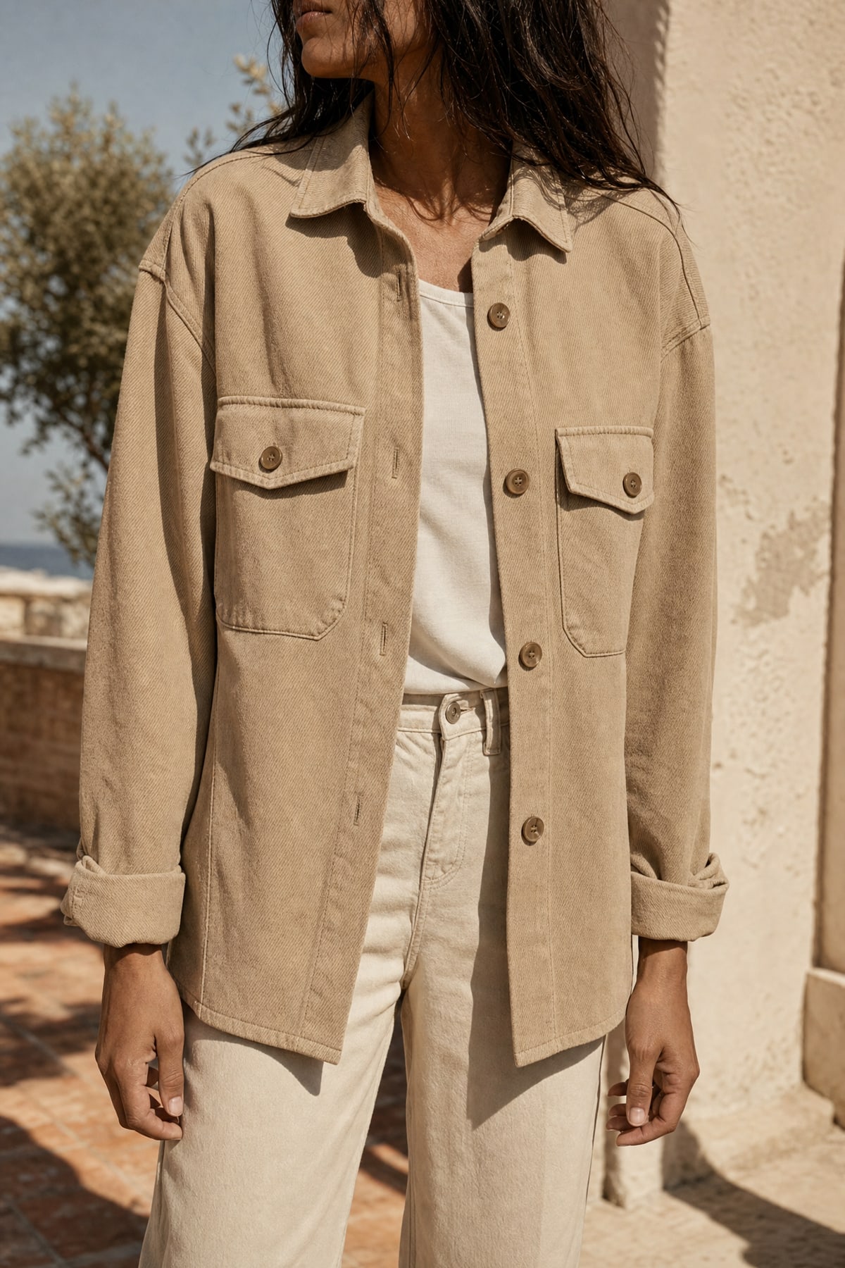 Overshirt in stone, worn outdoors in warm afternoon light