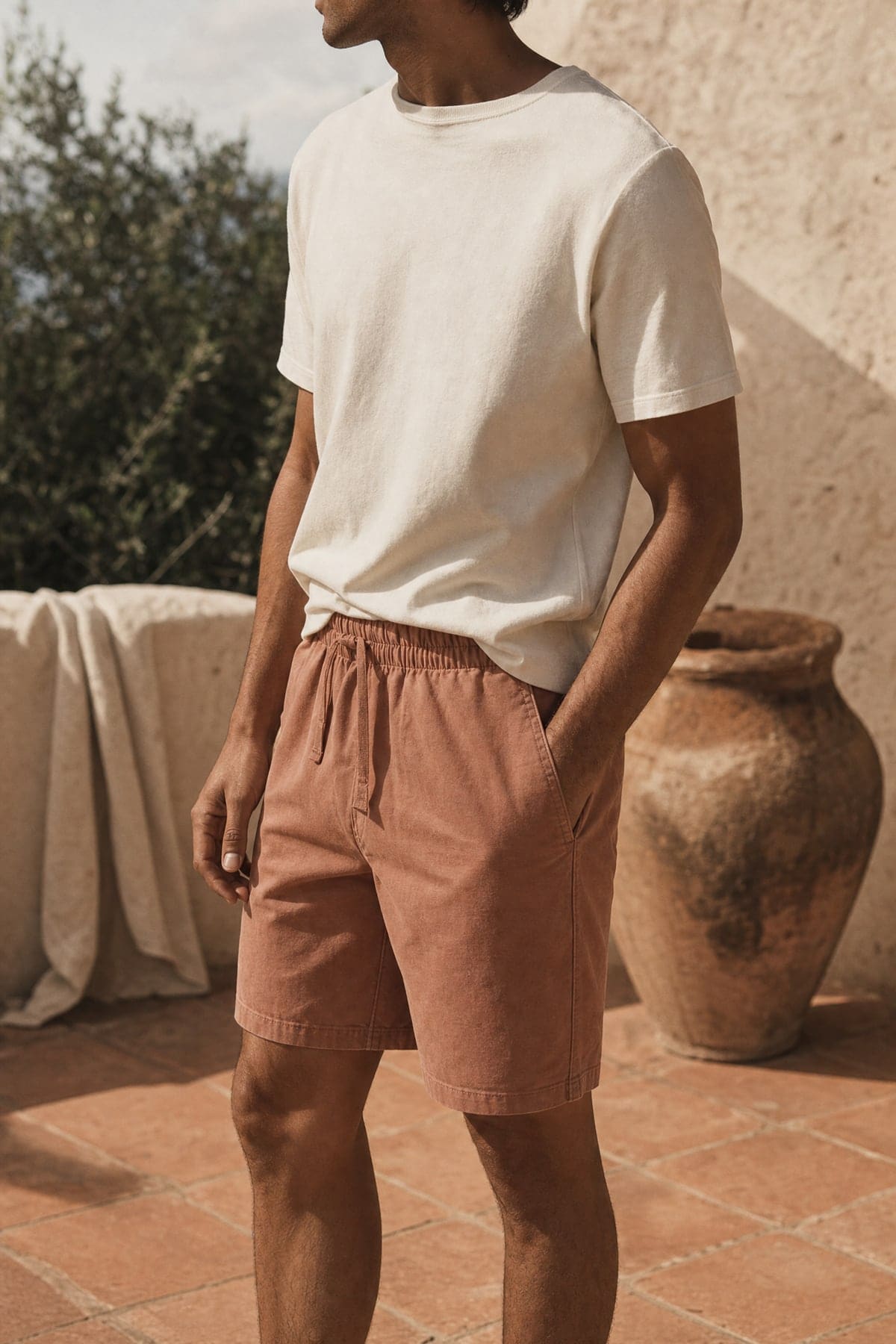 Shorts in clay, worn outdoors in warm afternoon light