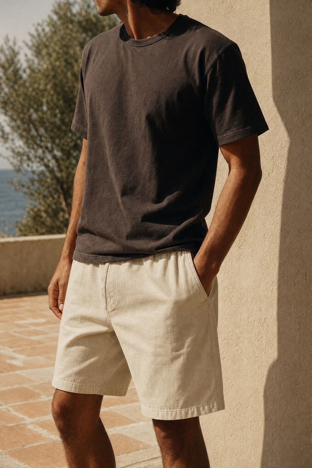 Shorts in sand, worn outdoors in warm afternoon light
