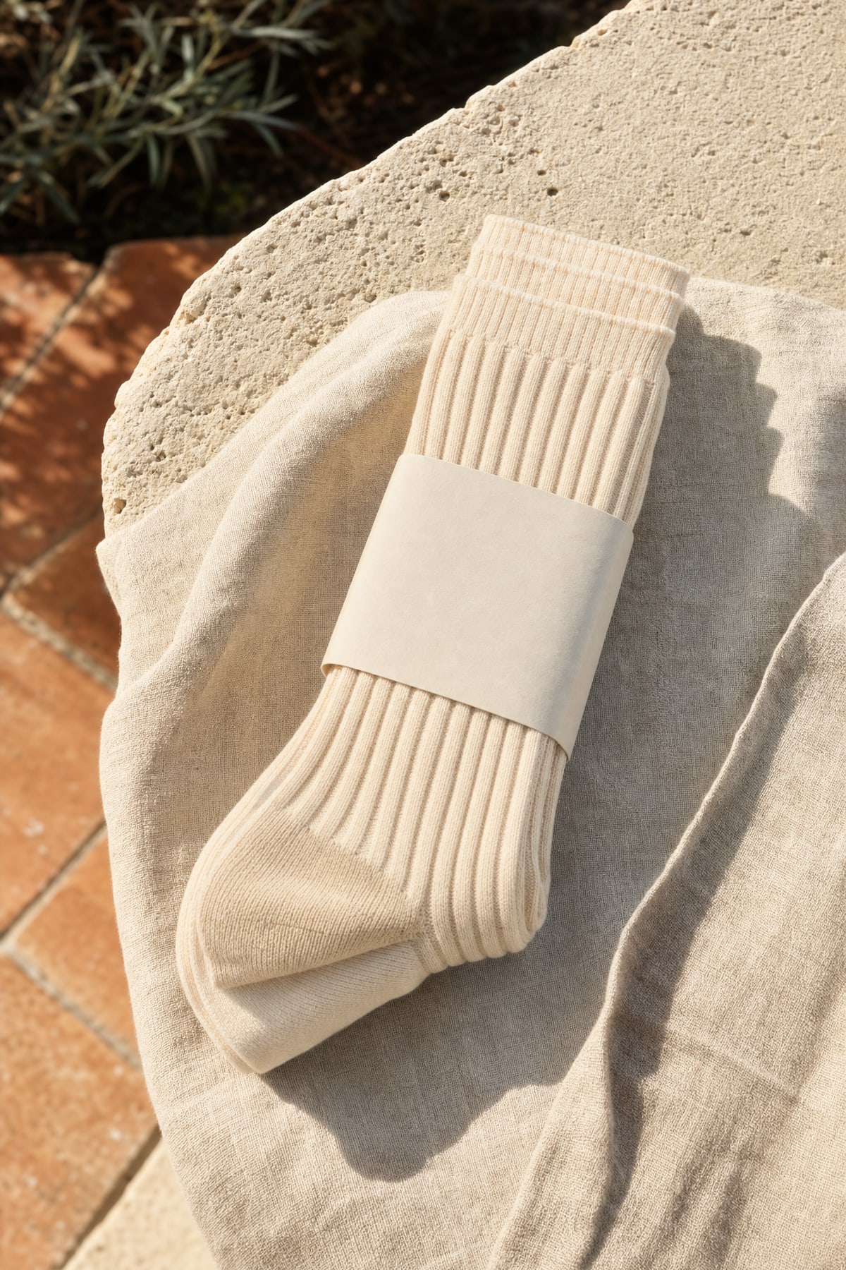 Socks in ecru, in warm afternoon light