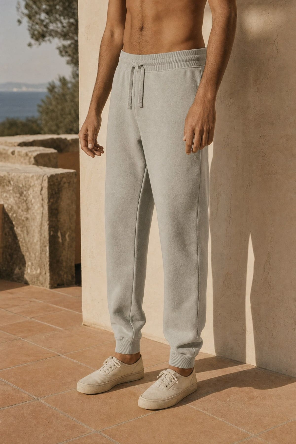 Sweats in mist, worn outdoors in warm afternoon light